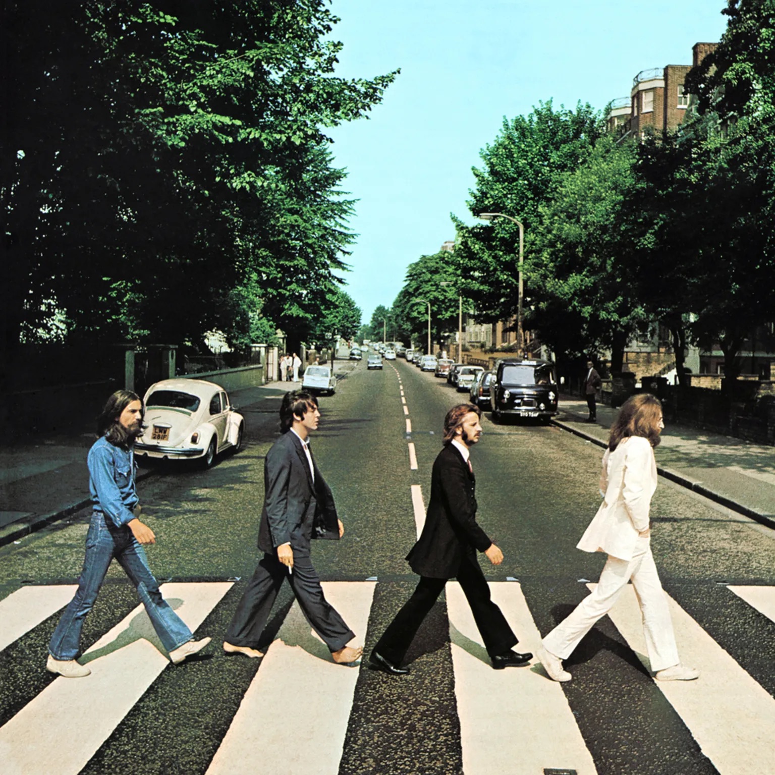 Picture of the Beatles walking across Abbey Road